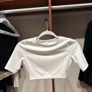 EUC Lululemon Wunder Train Super cropped t shirt white Size 2